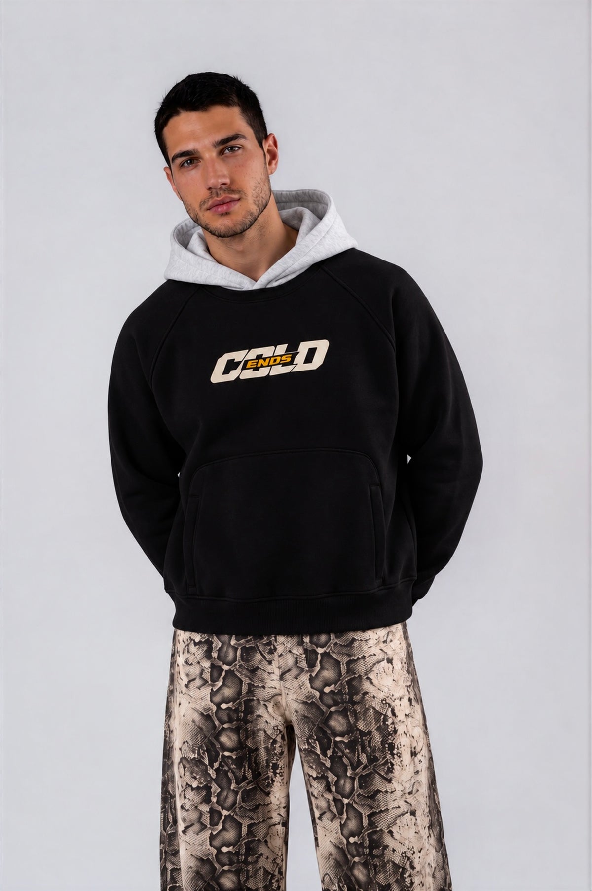 Model in a sun-faded zip hoodie